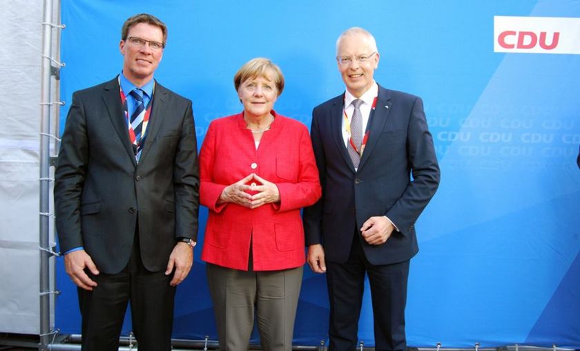 v.l.n.r.: Stephan Santelmann, Angela Merkel und Hermann-Josef Tebroke